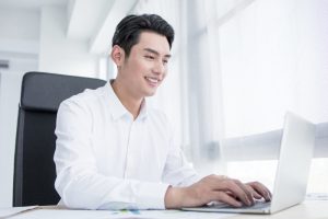 Man,Working,On,Laptop,From,Home.,Counting,Financial,Data.