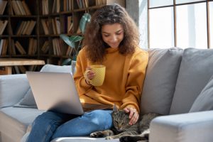 Happy,Relaxed,Hispanic,Teen,Girl,Student,Or,Freelancer,Relaxing,Sitting