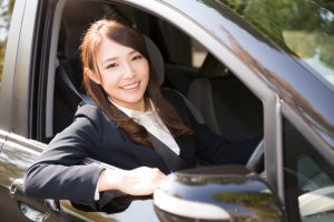 Beautiful,Young,Asian,Woman,In,A,Car