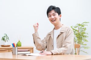 Young,Man,Studying,In,Room