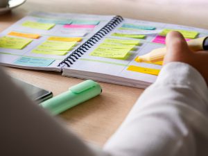 Close-up,Of,Agenda,Organize,With,Color-coding,Sticky,Notes,For,Time