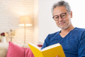 Asian,Elderly,Man,Who,Reads,A,Book,