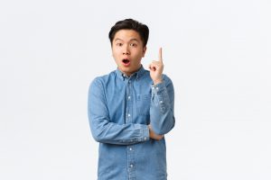 Excited,Smart,And,Creative,Asian,Man,In,Shirt,Having,Idea.