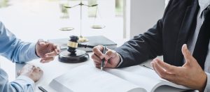 Consultation,And,Conference,Of,Male,Lawyers,And,Professional,Businesswoman,Working