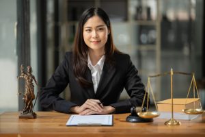 Female,Lawyer,Working,At,Client's,Office,Discussing,Documents