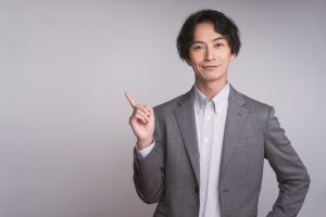 Business,Person,Portrait.,A,Man,In,A,Gray,Jacket,Is