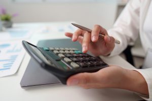 Accountant,Using,Calculator,For,Financial,Calculations